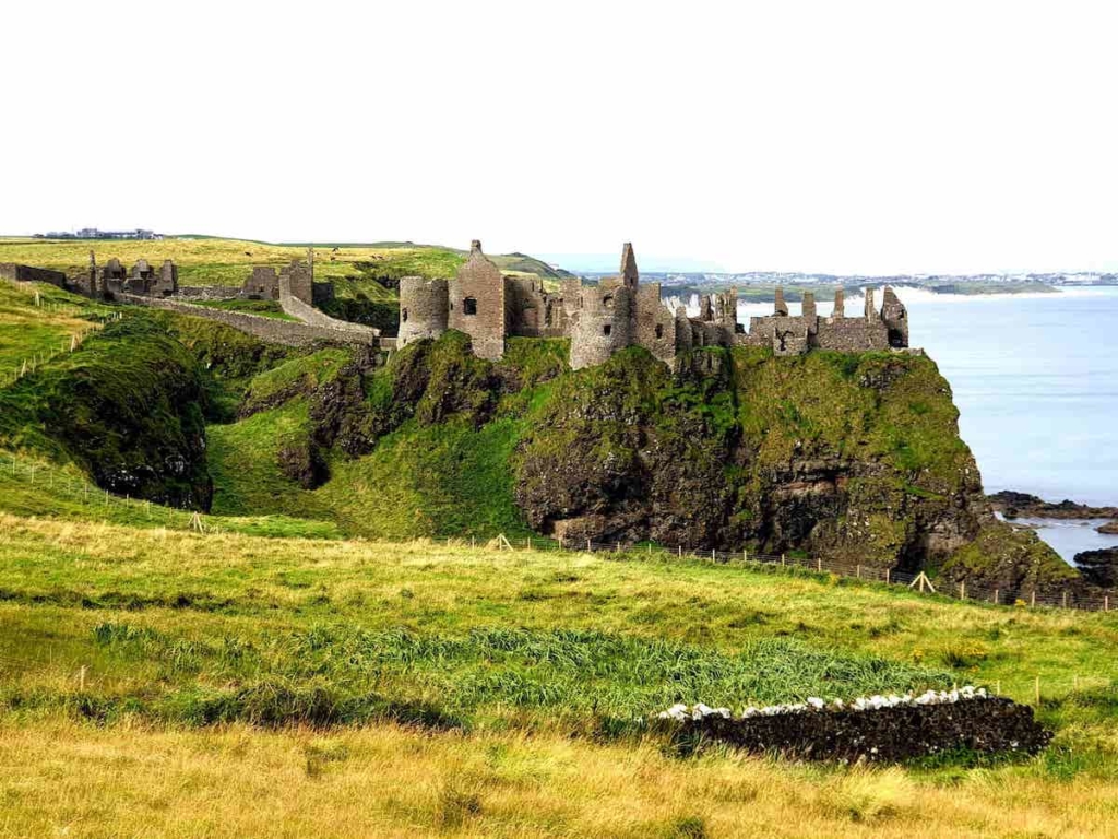Castle Dunluce with a view of Sea and cliffs in Northern ireland near Giants causeway and belfast