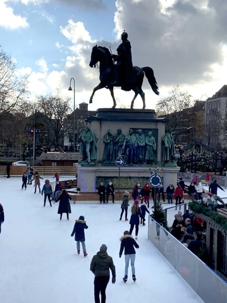 ice skating at heumarkt christmas market cologne